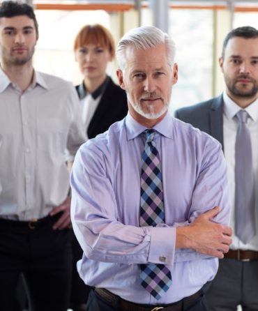 senior business man with his team at office